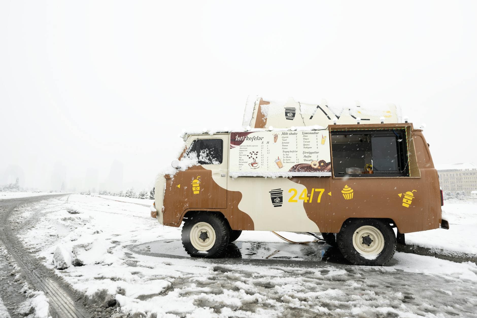 Hand holding a smartphone with AI chatbot app, emphasizing artificial intelligence and technology.