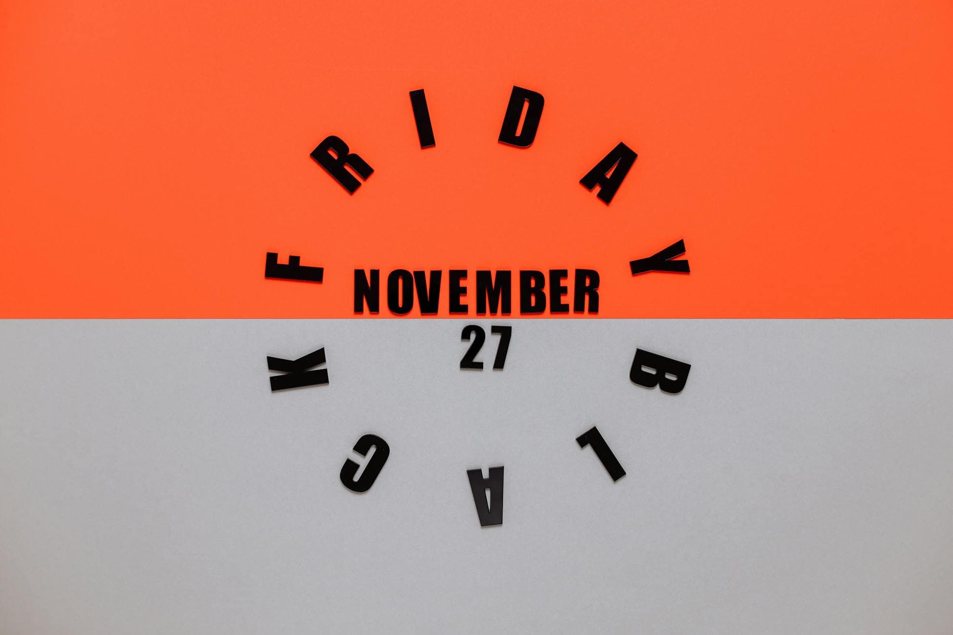 Person using a bank card for contactless payment at a modern checkout counter.